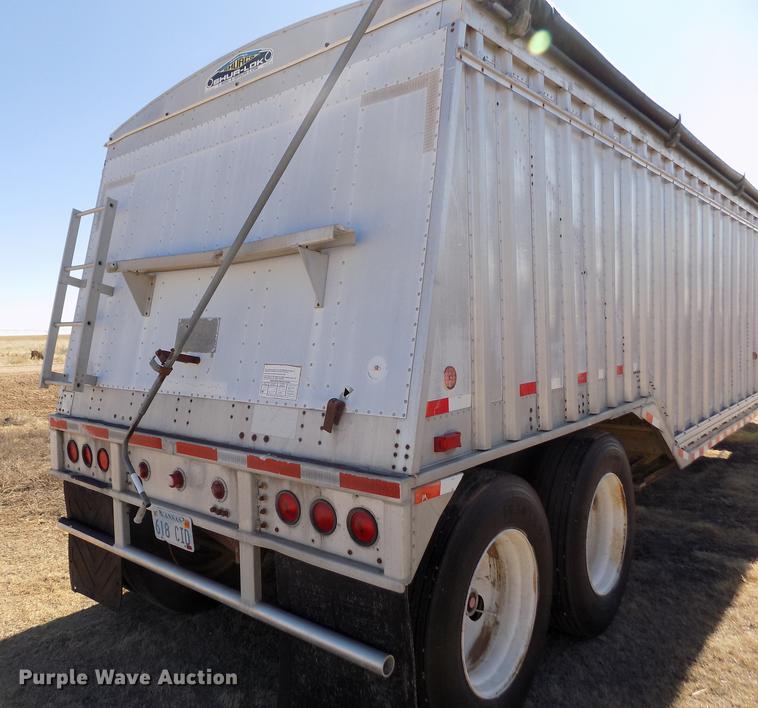 image for item FH9033 1984 Corn Husker 800 double hopper bottom grain trailer