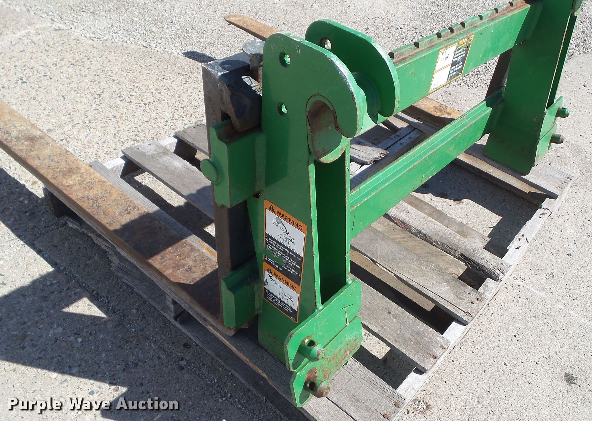 John Deere wheel loader forks in Monroe, IA Item EM9211 sold Purple