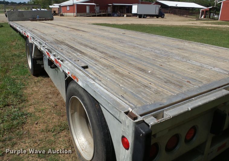 image for item DE7979 2004 Reitnouer 50T drop deck trailer
