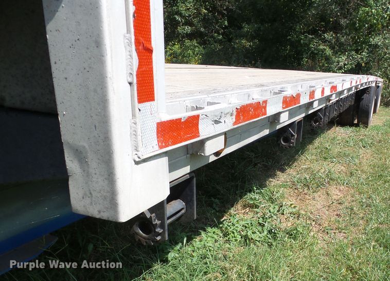 image for item DE7979 2004 Reitnouer 50T drop deck trailer