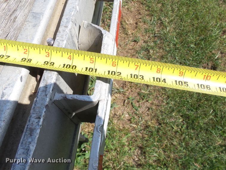 image for item DE7979 2004 Reitnouer 50T drop deck trailer