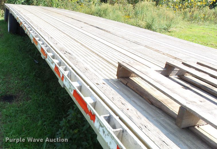 image for item DE7979 2004 Reitnouer 50T drop deck trailer