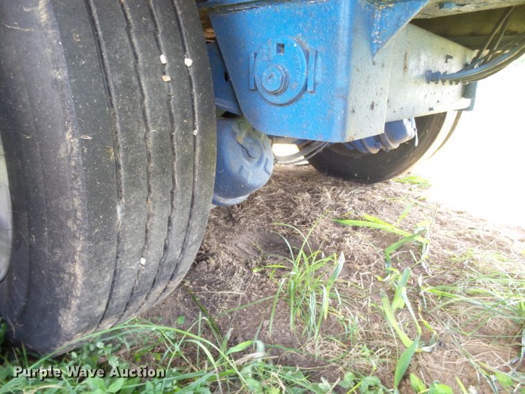 image for item DE7979 2004 Reitnouer 50T drop deck trailer