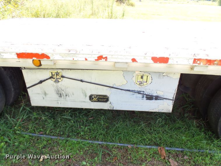 image for item DE7979 2004 Reitnouer 50T drop deck trailer