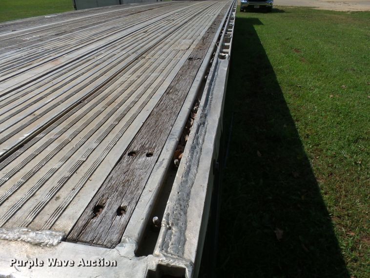 image for item DE7979 2004 Reitnouer 50T drop deck trailer