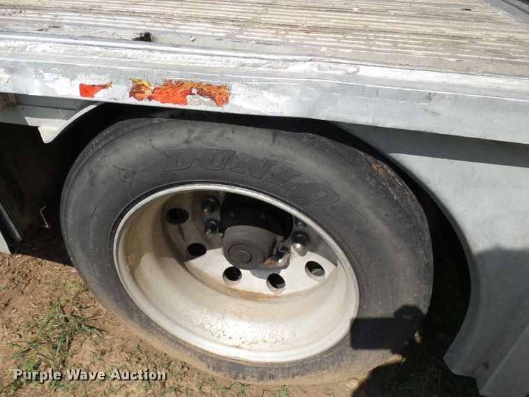 image for item DE7979 2004 Reitnouer 50T drop deck trailer