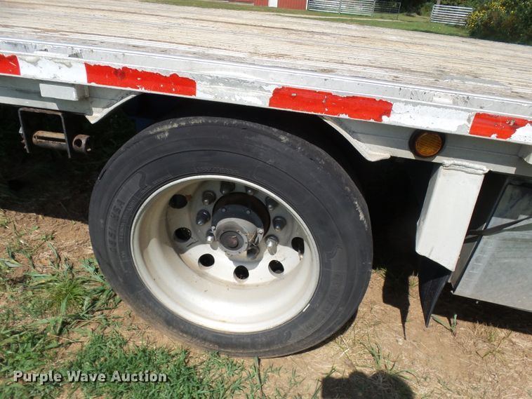 image for item DE7979 2004 Reitnouer 50T drop deck trailer