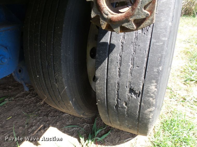 image for item DE7979 2004 Reitnouer 50T drop deck trailer