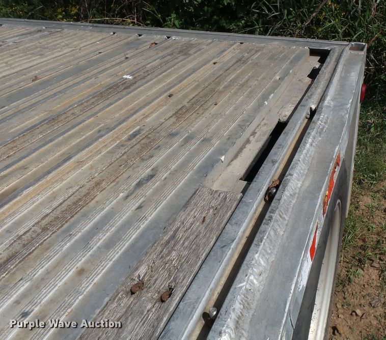 image for item DE7979 2004 Reitnouer 50T drop deck trailer