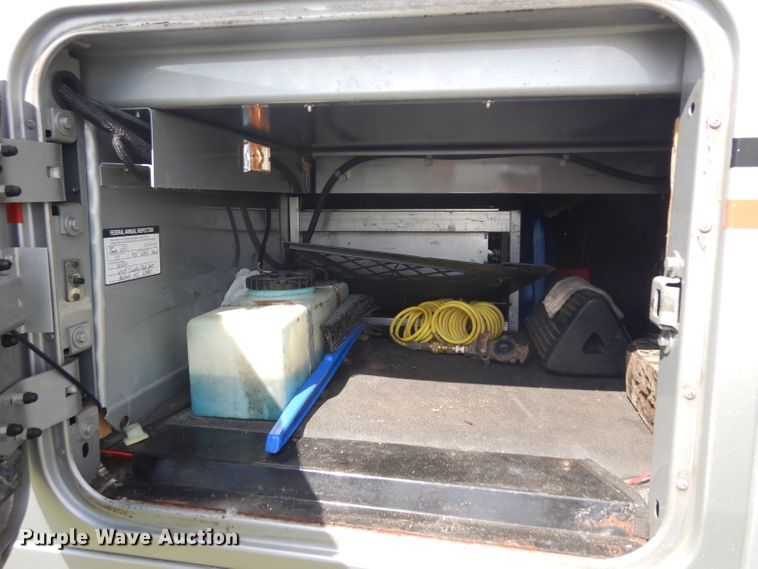 image for item GI9266 1994 White GMC WIA semi truck