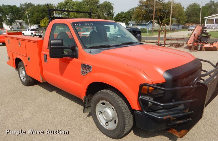 image for item DB4977 2009 Ford F250 Super Duty utility bed pickup truck