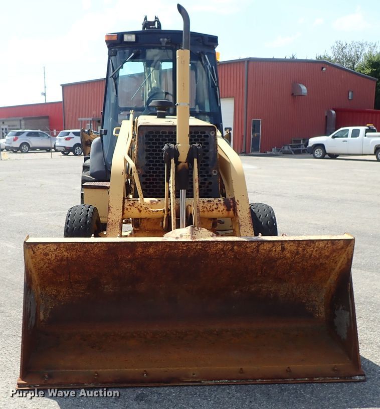 image for item DE1083 1997 John Deere 310E backhoe