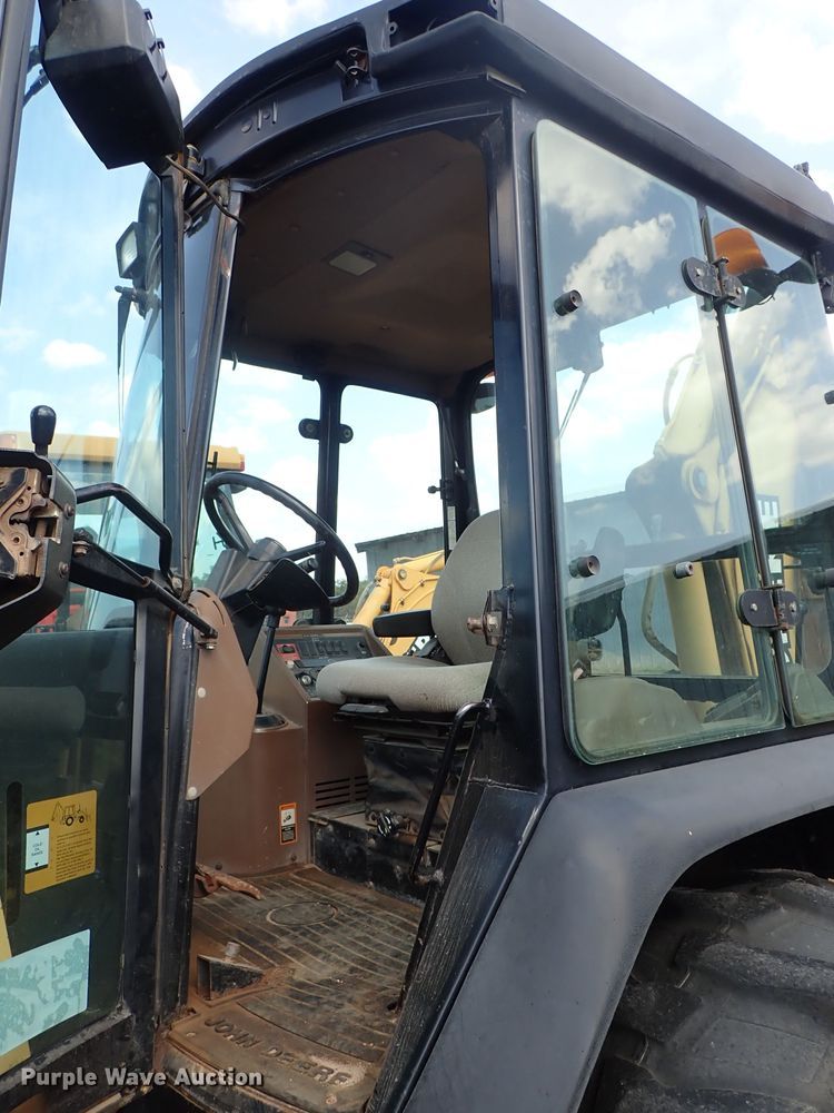 image for item DE1083 1997 John Deere 310E backhoe