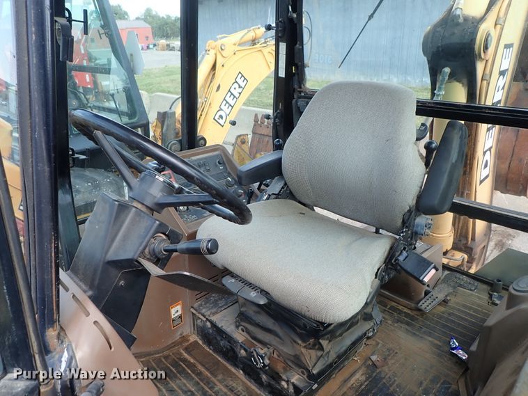 image for item DE1083 1997 John Deere 310E backhoe