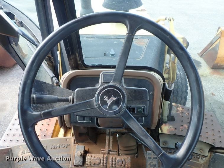 image for item DE1083 1997 John Deere 310E backhoe