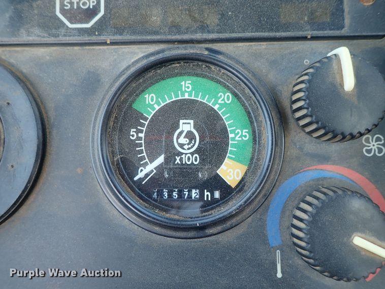 image for item DE1083 1997 John Deere 310E backhoe