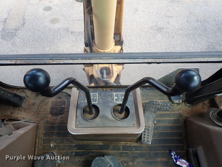 image for item DE1083 1997 John Deere 310E backhoe