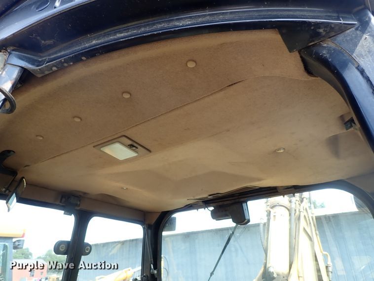 image for item DE1083 1997 John Deere 310E backhoe