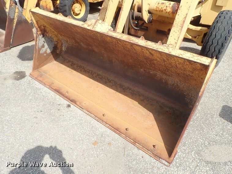 image for item DE1083 1997 John Deere 310E backhoe