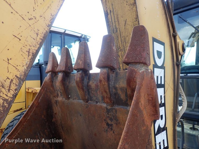 image for item DE1083 1997 John Deere 310E backhoe