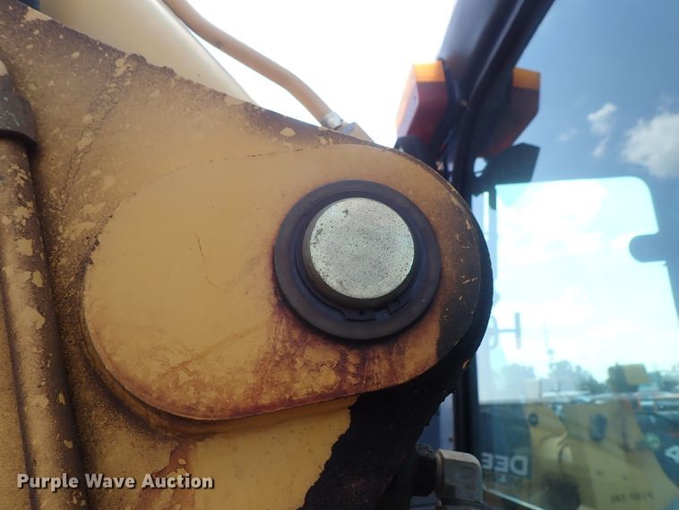 image for item DE1083 1997 John Deere 310E backhoe