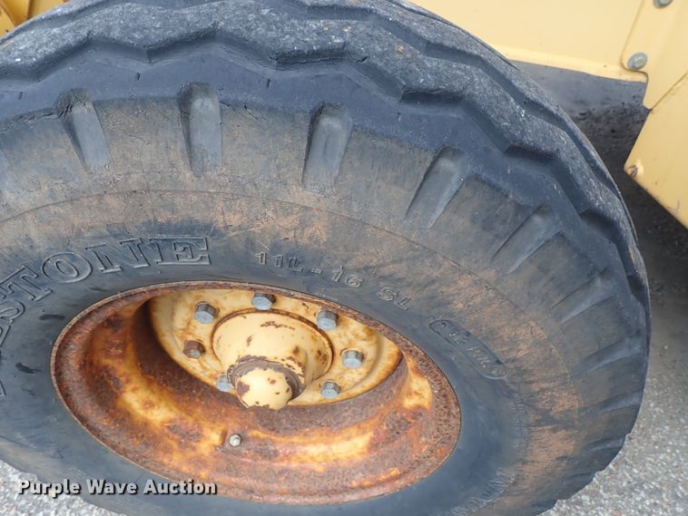 image for item DE1083 1997 John Deere 310E backhoe