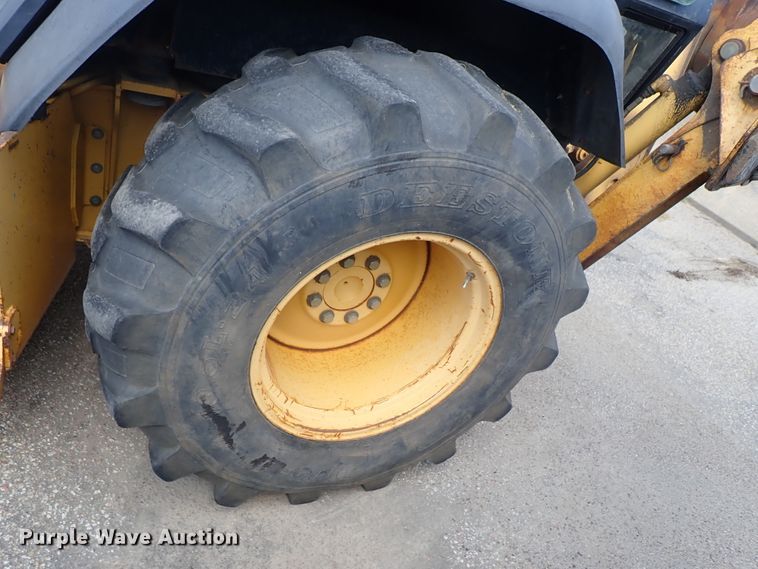 image for item DE1083 1997 John Deere 310E backhoe