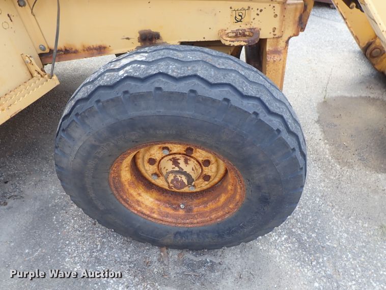 image for item DE1083 1997 John Deere 310E backhoe