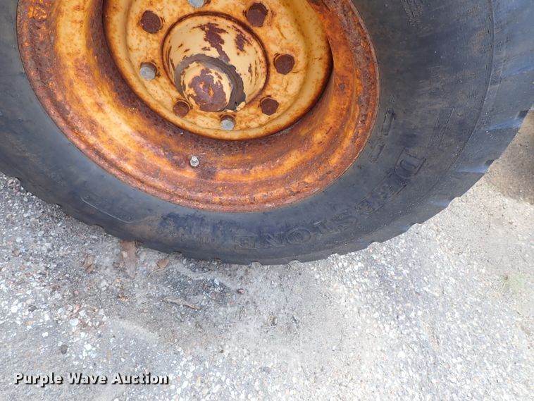 image for item DE1083 1997 John Deere 310E backhoe