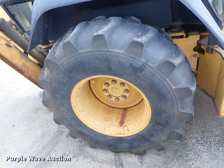 image for item DE1083 1997 John Deere 310E backhoe