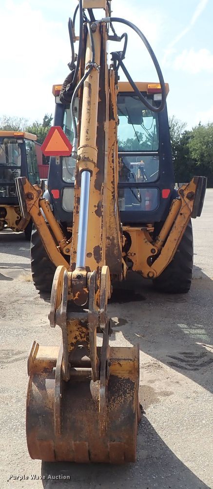 image for item DE1084 1999 John Deere 310E backhoe