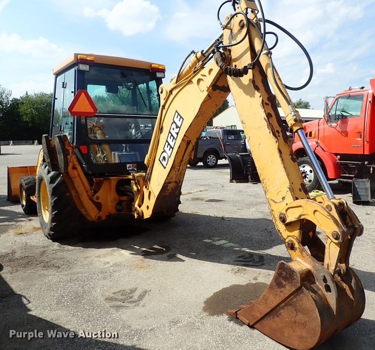 image for item DE1084 1999 John Deere 310E backhoe