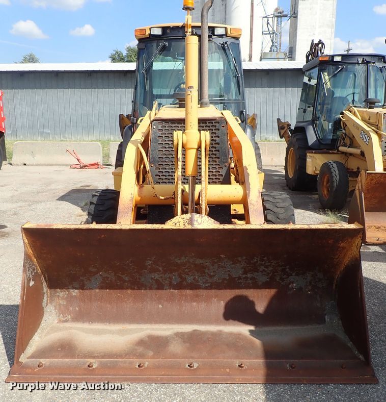 image for item DE1084 1999 John Deere 310E backhoe