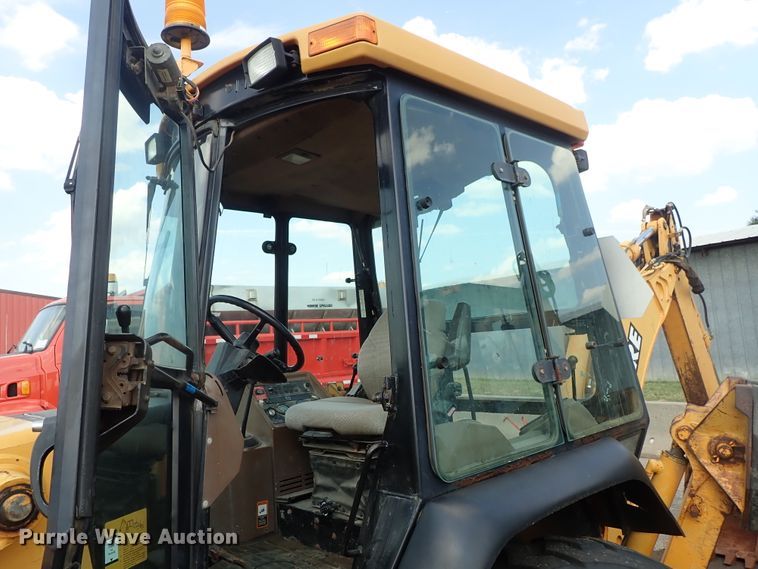 image for item DE1084 1999 John Deere 310E backhoe