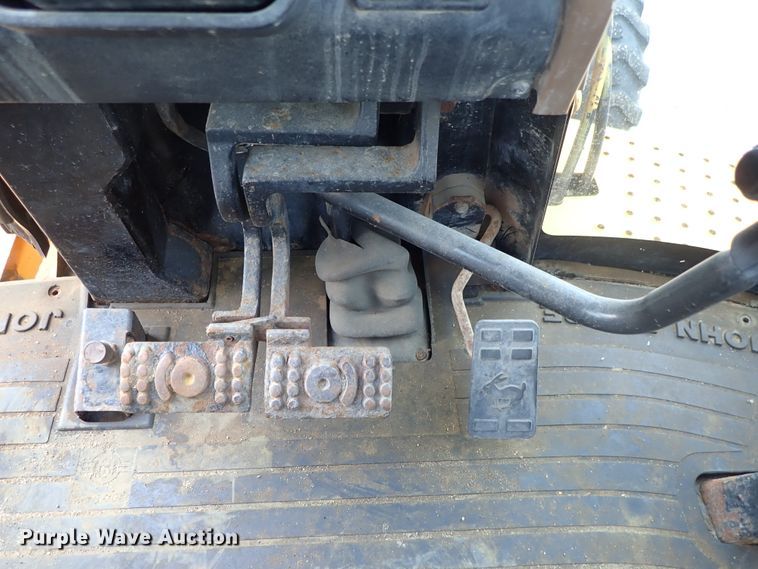 image for item DE1084 1999 John Deere 310E backhoe