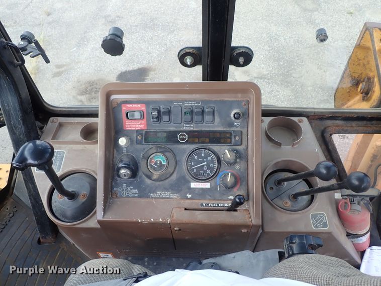 image for item DE1084 1999 John Deere 310E backhoe