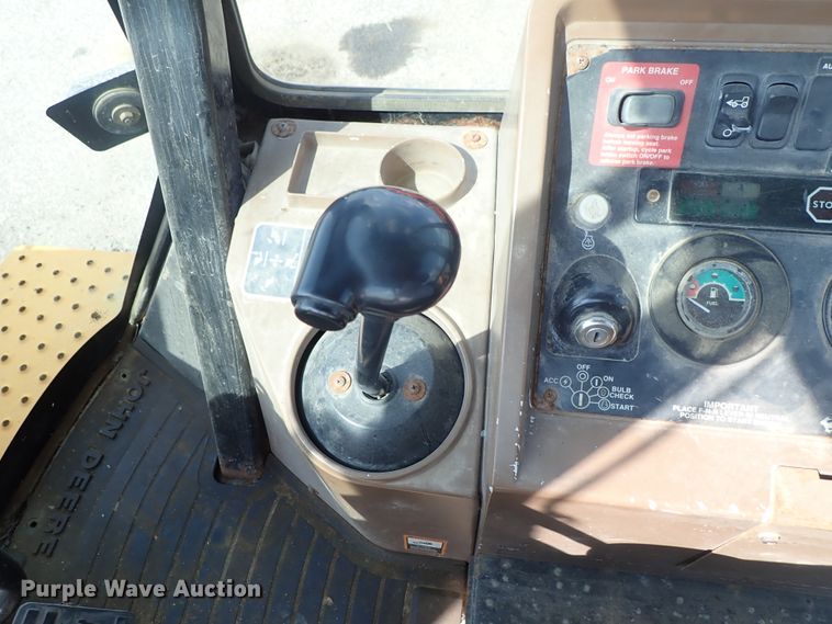 image for item DE1084 1999 John Deere 310E backhoe