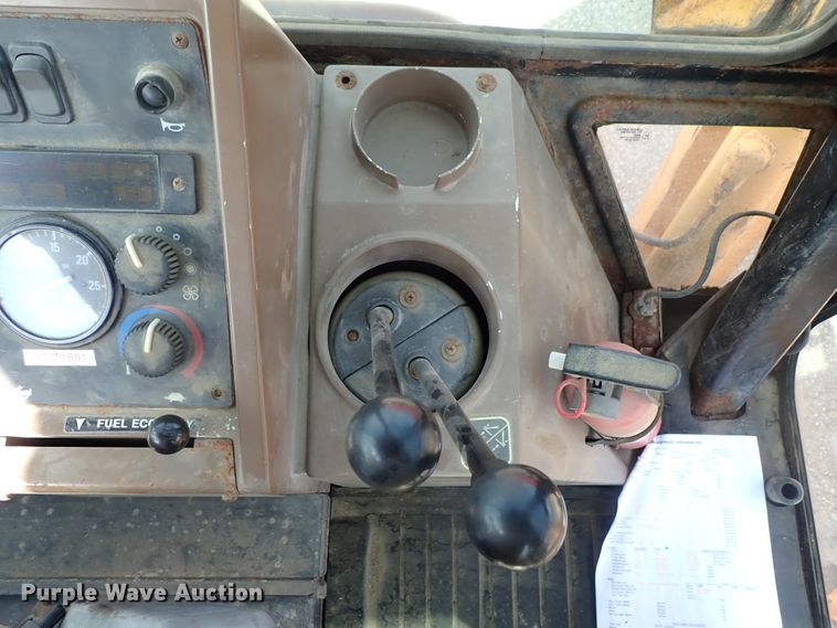 image for item DE1084 1999 John Deere 310E backhoe