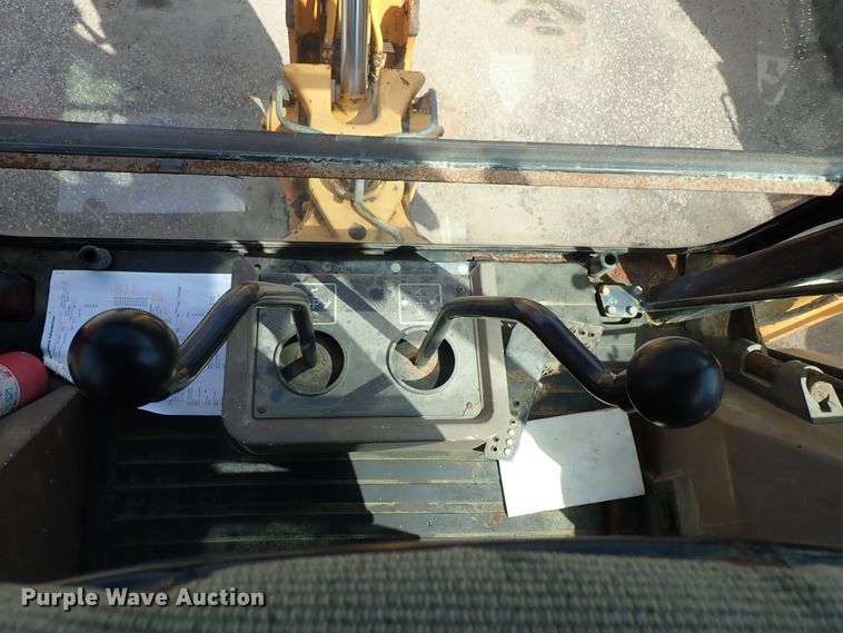 image for item DE1084 1999 John Deere 310E backhoe