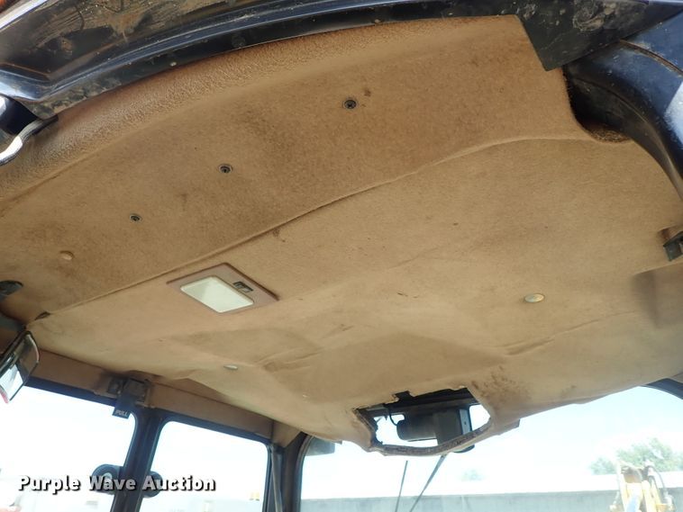 image for item DE1084 1999 John Deere 310E backhoe