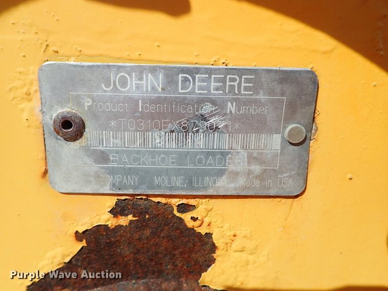 image for item DE1084 1999 John Deere 310E backhoe