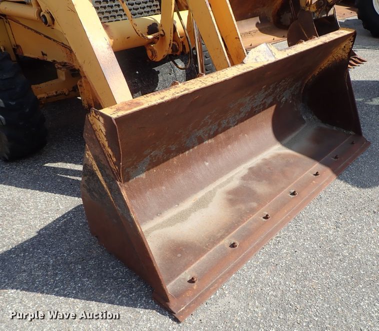 image for item DE1084 1999 John Deere 310E backhoe