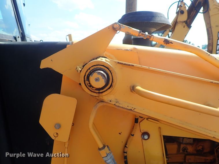 image for item DE1084 1999 John Deere 310E backhoe
