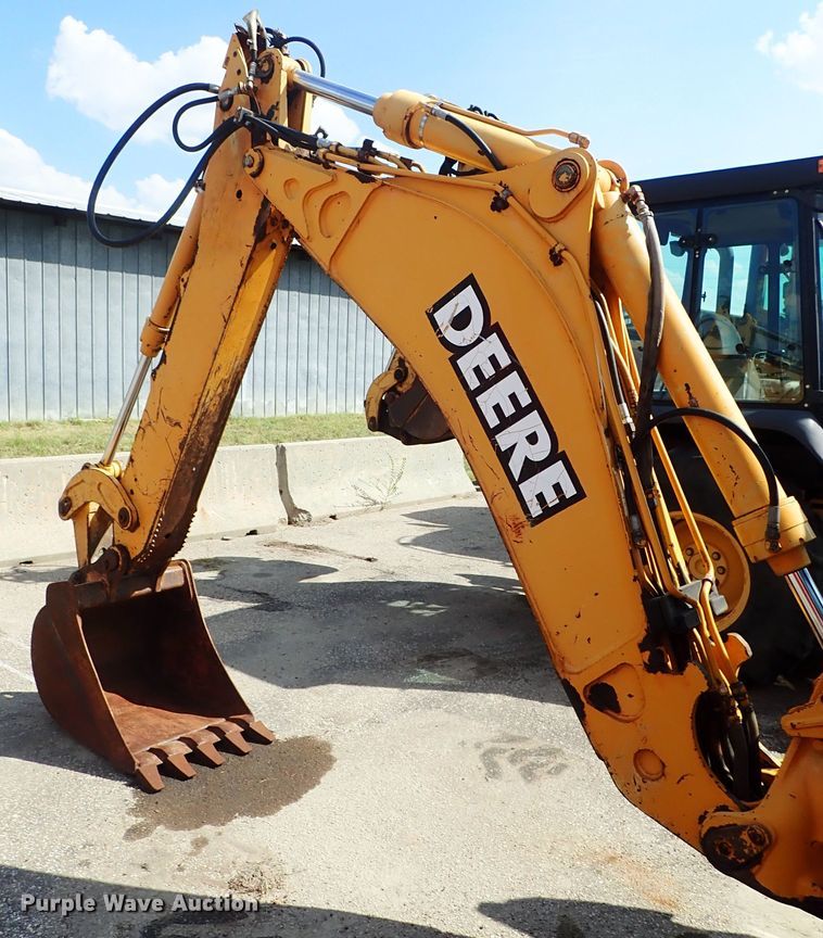 image for item DE1084 1999 John Deere 310E backhoe