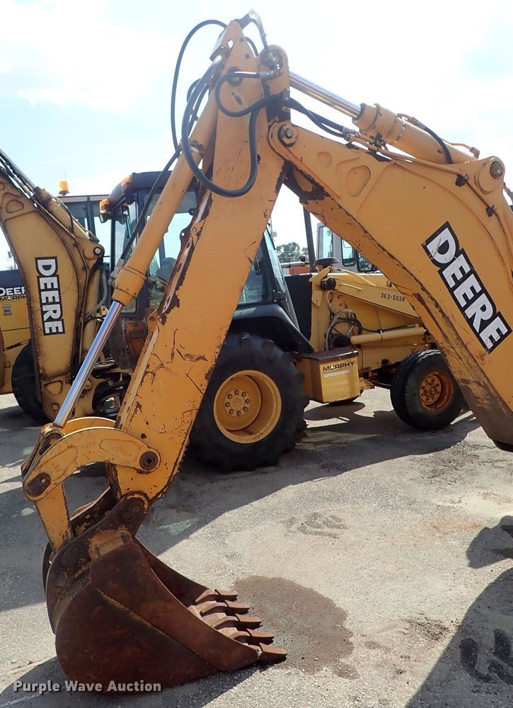image for item DE1084 1999 John Deere 310E backhoe