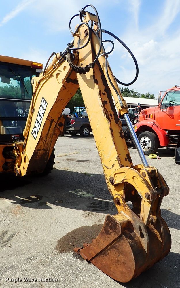 image for item DE1084 1999 John Deere 310E backhoe