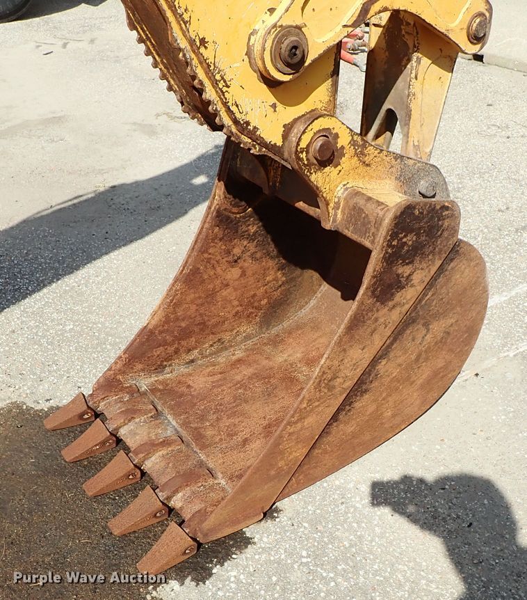 image for item DE1084 1999 John Deere 310E backhoe