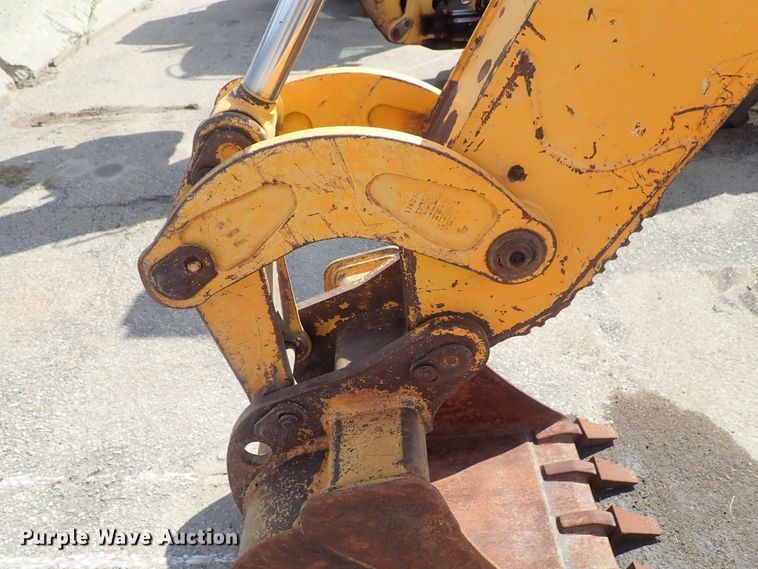 image for item DE1084 1999 John Deere 310E backhoe