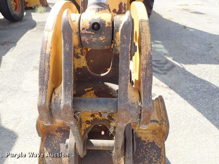 image for item DE1084 1999 John Deere 310E backhoe