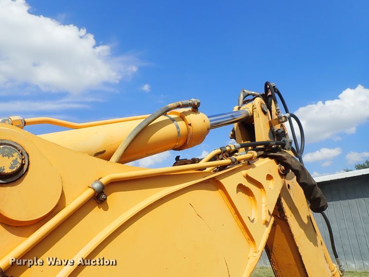 image for item DE1084 1999 John Deere 310E backhoe